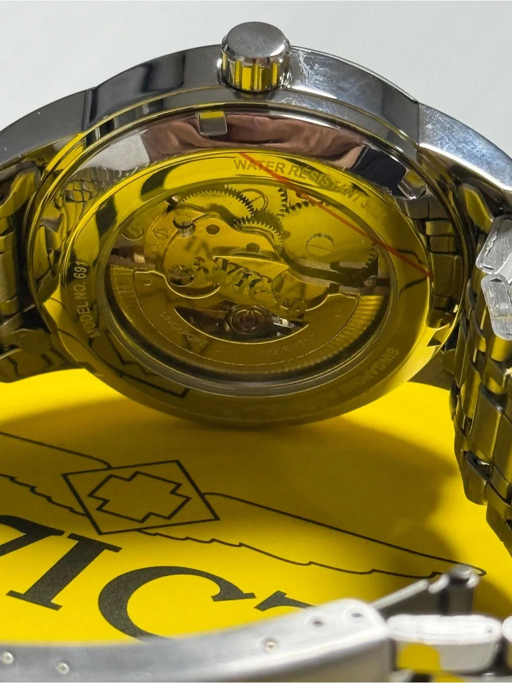 Invicta Silver Stainless Steel Men's Watch with Black Skeleton Dial